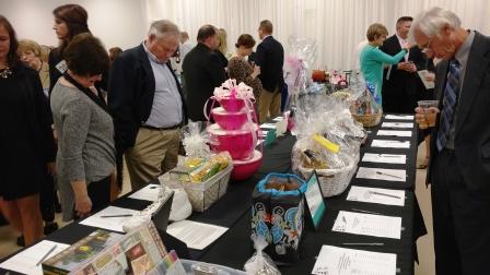 Attendees shop the silent auction items