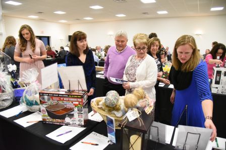 Attendees shop the 2018 silent auction items